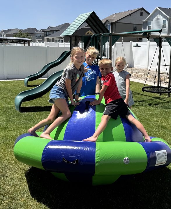 Kids playing on OZIS inflatable