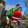 OZIS 20FT Christmas Inflatable Santa Claus Holding Gift Bag
