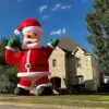 OZIS 20FT Christmas Inflatable Santa Claus Holding Gift Bag